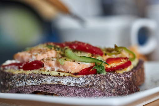Delicious Brunch Toast: wholegrain bread, salmon and red chili pepper