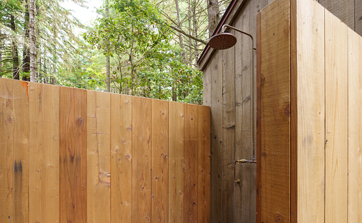 Outdoor shower in forest with redwood in California