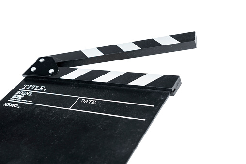 Black clapper board isolated over white background