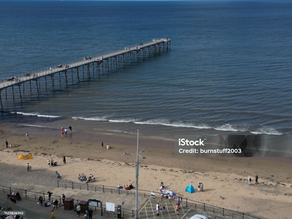 aerial view of Saltburn Pier  North Yorkshire aerial view of Saltburn Pier, victorian jetty and promenade or esplanade. North Yorkshire seaside town Aerial View Stock Photo