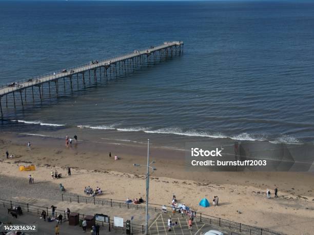 Aerial View Of Saltburn Pier North Yorkshire Stock Photo - Download Image Now - Aerial View, Architecture, Beach