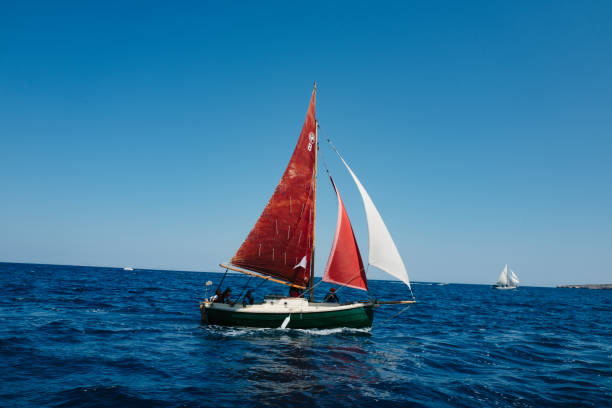 istock Sailing in a boat with red sails 1423838448