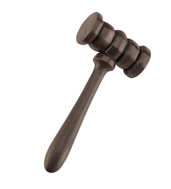 istock Wooden justice gavel and block with brass 1423842987
