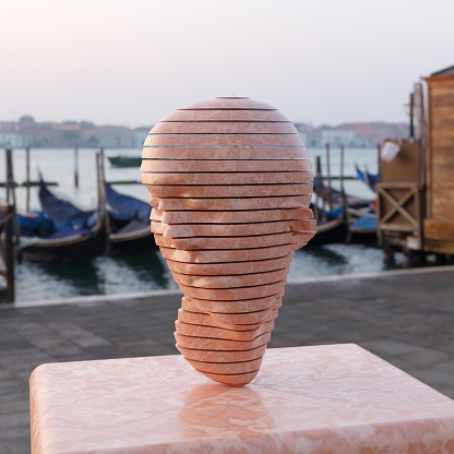 Art id displayed in Venice. Pink marble head, sculpture. *** The head was digitally rendered  and a release is provided ***