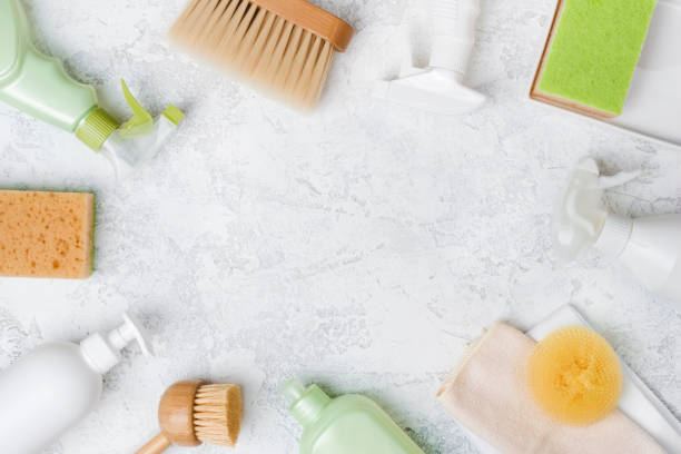istock Eco brushes and cleaning products on marble background with space 1423854268