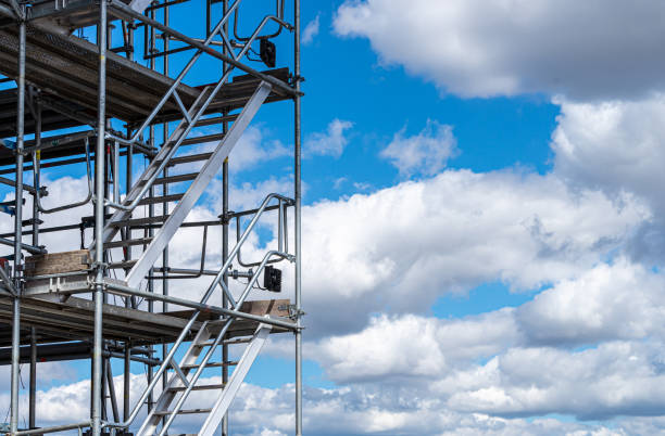 istock Low Angle View Of Scaffolding Against Cloudy Sky 1423860390