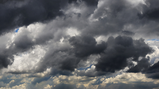 Grey cumulus overcast cloudscape as a background