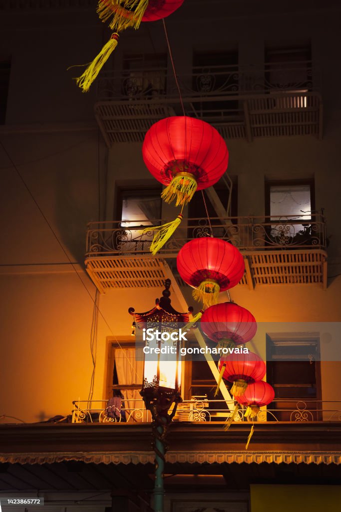 Chinatown, San Francisco,. Grant Avenue. Chinese New Year lanterns. City streetlights in Chinatown at night. Exterior Asian buildings on Grant Avenue, California. Apartment Stock Photo