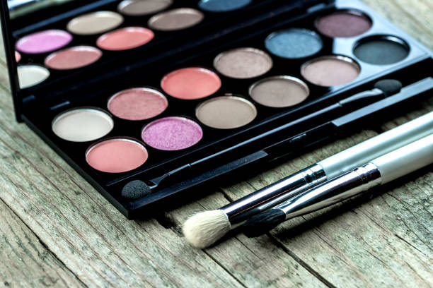 Women's cosmetics on wooden background