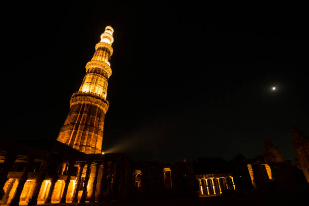 istock Qutub minar at night with lights 1423881809