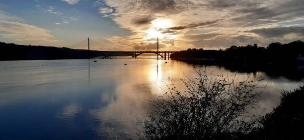 istock Sunset with water and bridges 1423884515