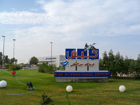 Kish, Iran- February 8, 2009: Kish Island is the only Free Trade Zone and holiday resort in Persian Gulf of Iran. Here is the road sign to Kish Airport.