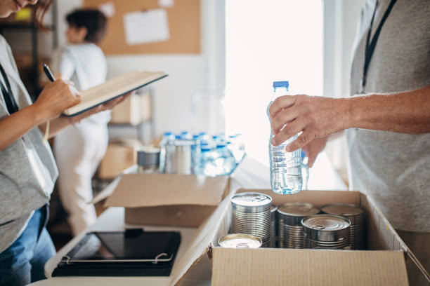 istock People working for charity together 1423900879