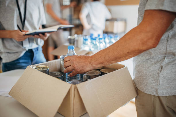 istock People working for charity together 1423900985