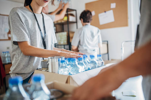 istock People working for charity together 1423901067