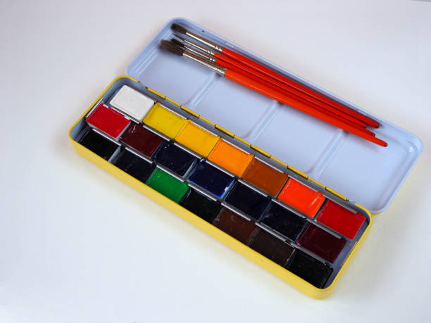 istock A palette of watercolors and paint brushes 1423907608