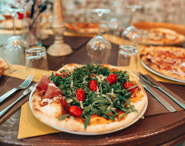 istock aragula italian pizza with tomatoes 1423908273