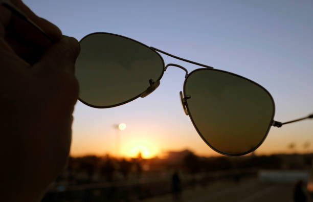 istock Sunset through a pair of sunglasses 1423910891