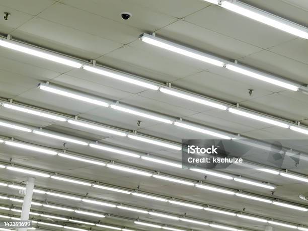 Retail Symmetry Stock Photo - Download Image Now - Fluorescent Light, Ceiling, Illuminated