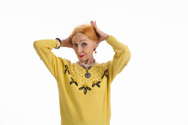 istock Woman fixing her hair. 1423926714