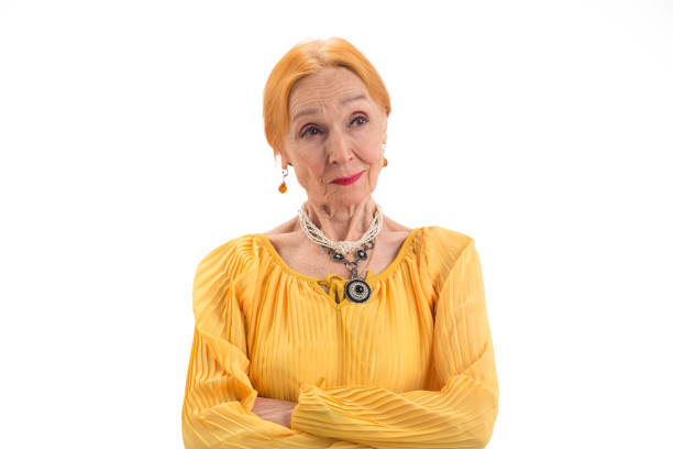 istock Old woman with arms crossed. 1423926831