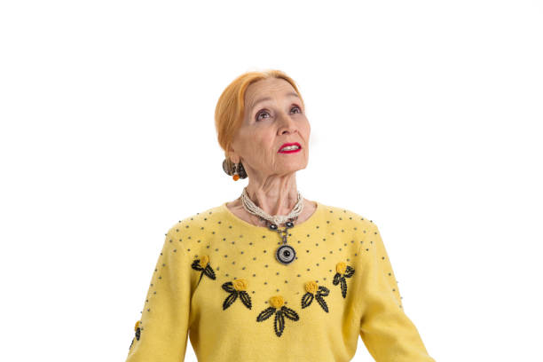istock Thoughtful woman looking up. 1423927855