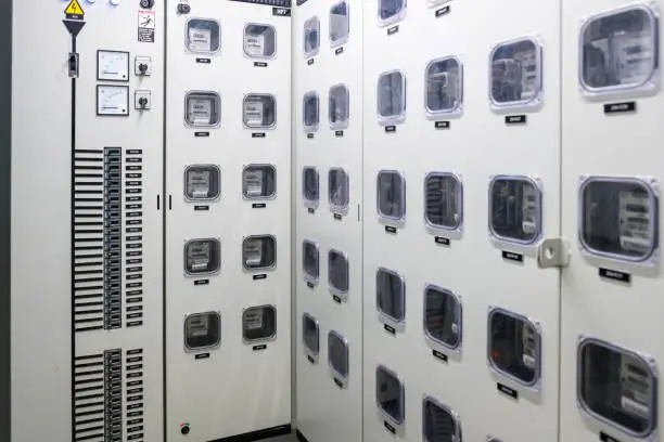 Photo of Electric meter control room in building, electrical meter measurement tool
