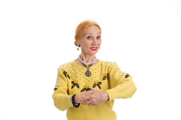 istock Old woman smiling isolated. 1423931798