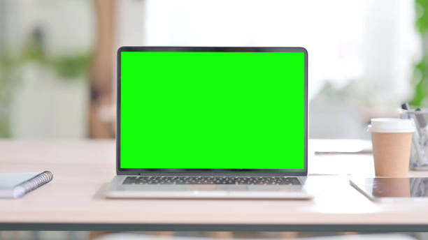 istock Laptop with Green Screen in Office 1423933294