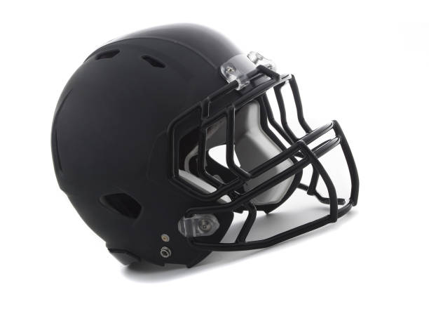 istock Black Football Helmet on white 1423934337