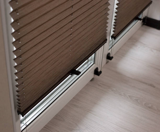 istock Pleated blinds close up on the window 1423934823