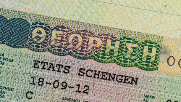 istock Schengen visa in the passport close-up. 1423936612