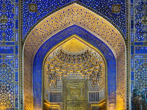 Ancient Mausoleum Registan with ornamental mosaic located in Samarkand. Ultra Wide Angle Architecture Shot. Samarkand, Silk Road, Uzbekistan, Central Asia.