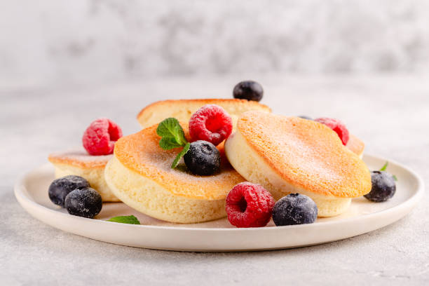 istock Japanese soft pancakes with berries 1423952146