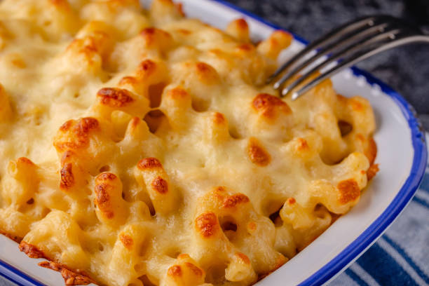 istock American mac and cheese, macaroni pasta in cheesy sauce 1423953092