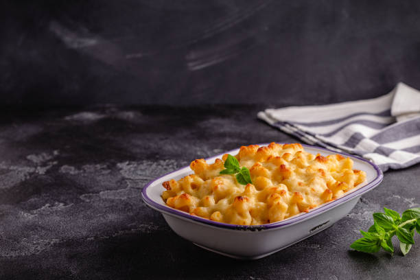 istock American mac and cheese, macaroni pasta in cheesy sauce 1423953134
