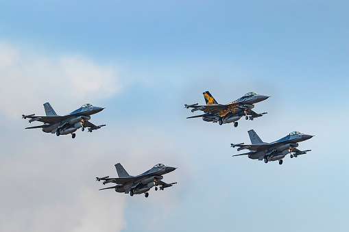 Hechtel-Eksel, Belgium 09.11.2022 - 4 F16s of Thundertigers, Belgian Air Force, in flight during the Sanicole International Airshow 2022