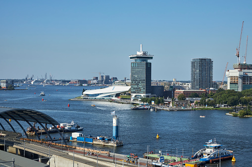 A'DAM Tower The River IJ waterfront on a summer day, Amsterdam Noord, The Netherlands.