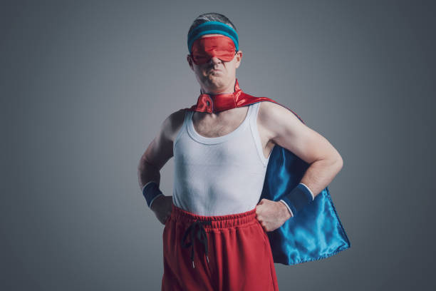 istock Funny superhero wearing a sleep mask 1423960426