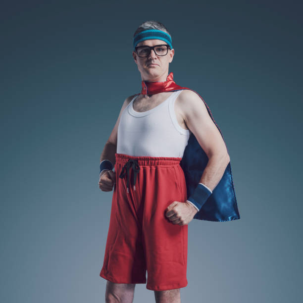 istock Funny confident superhero with glasses portrait 1423961028