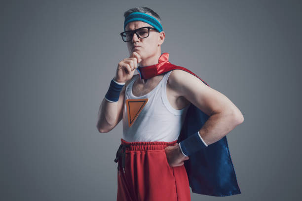 istock Funny superhero posing with hand on chin 1423961154