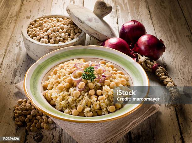 Risotto With Chickpeas And Onions Stock Photo - Download Image Now - Chick-Pea, Risotto, Crockery