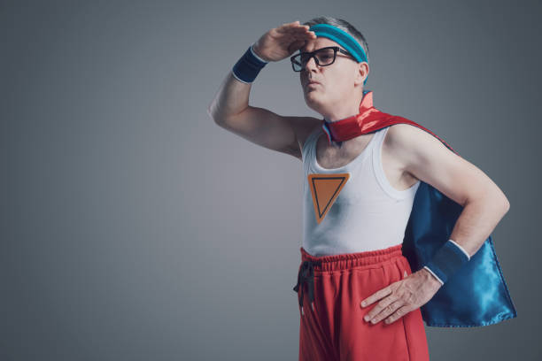istock Funny nerd superhero looking away 1423961938