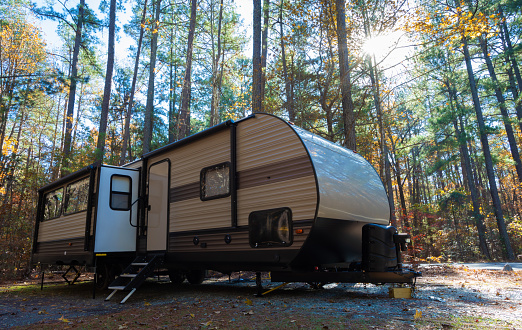 Camping trailer in a North Carolina forest in the daytime