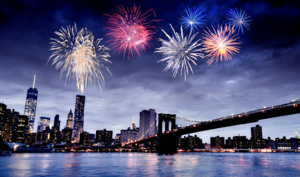 istock Fireworks over Brooklyn Bridge and One World Trade Center. 1423973593