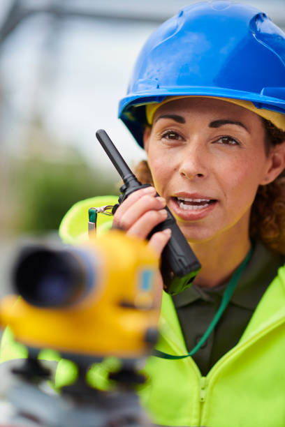 istock site surveyor on walkie talkie 1423974084