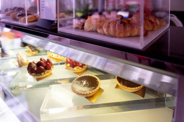 istock Showcases with cakes in a pastry shop 1423974105