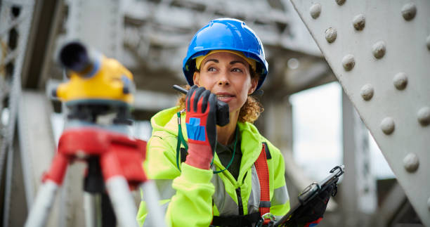 female steel surveyor