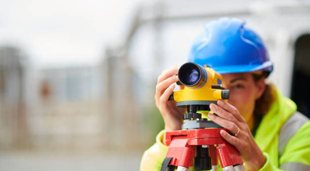 female site surveyor female surveyor theodolite photos stock pictures, royalty-free photos & images