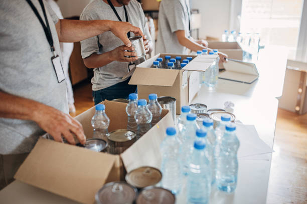 istock People working for charity together 1423976350